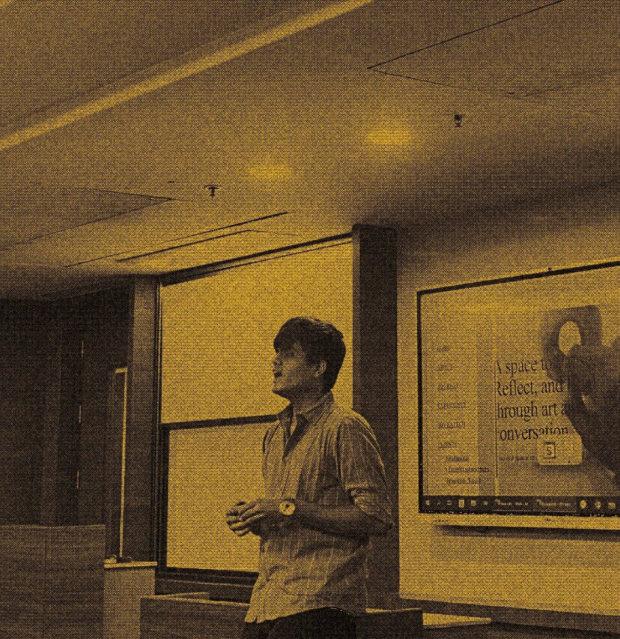 Soham Joshi speaking in front of a presentation